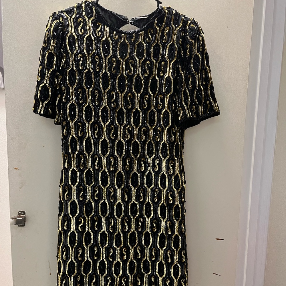 Beautiful black dress with gold sequences